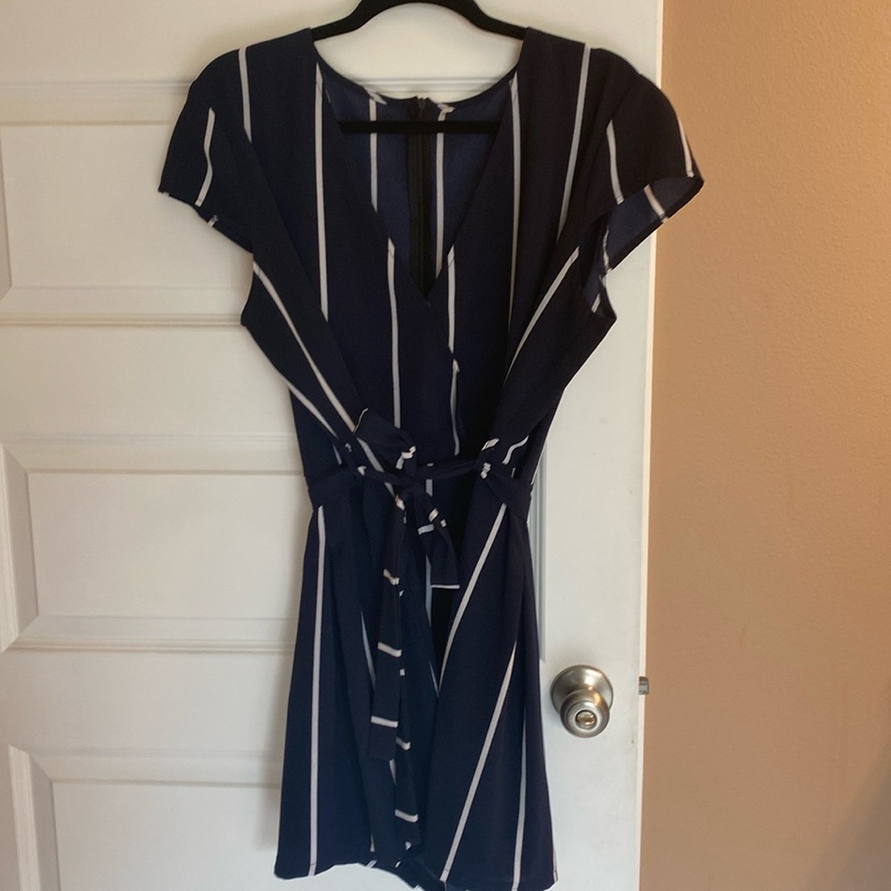 Super cute shorts romper. New without tag